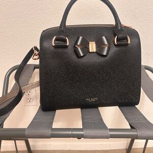 Ted baker purse. Used very few times it’s pretty like new.